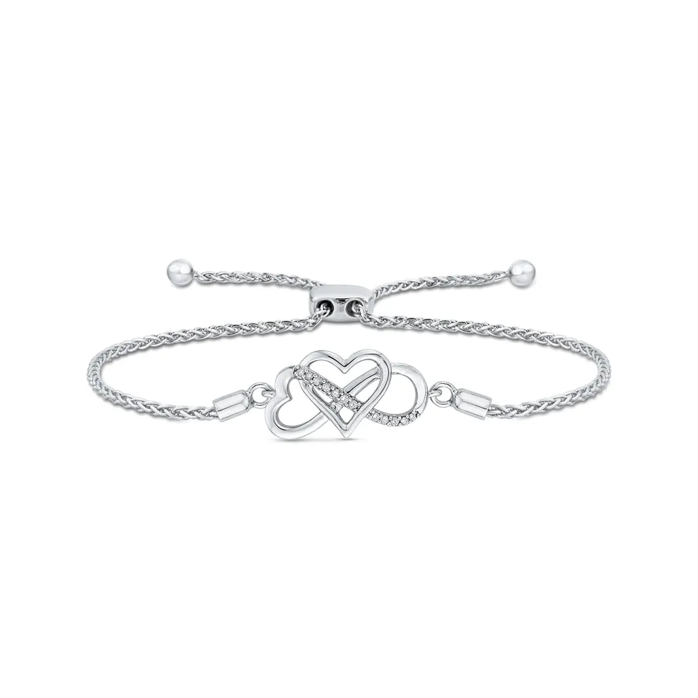 KATARINA Heart Shaped Infinity Diamond Tennis Bracelet (1/20 cttw)